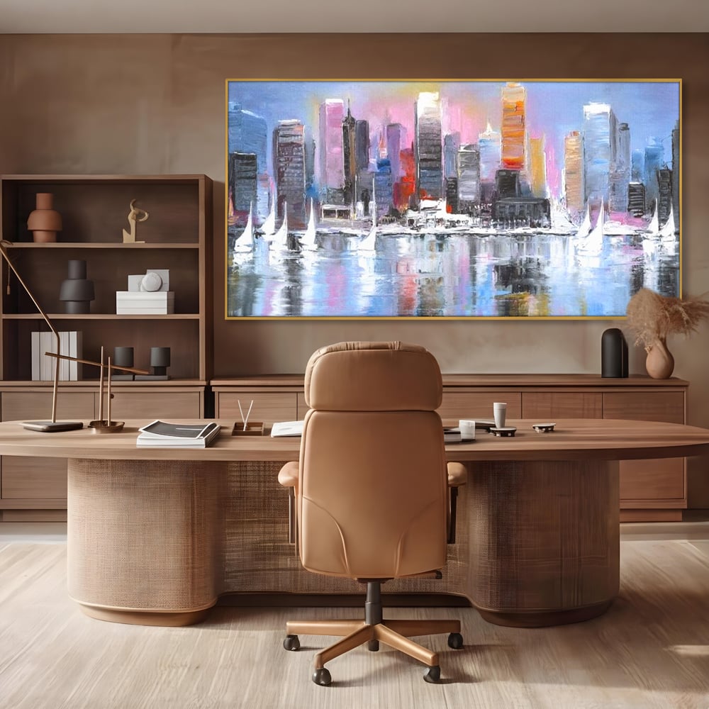 Tablou canvas cu pictura peisaj urban cu vele pe apa, in rama de aluminiu auriu, pe perete intr-un birou